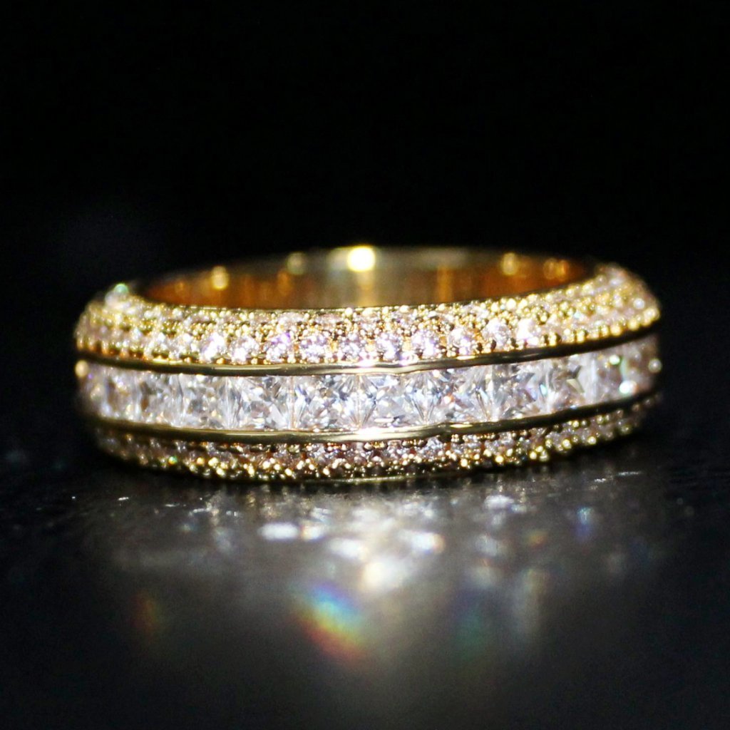 Princess Cut Channel Set Micro Pave CZ Eternity Band Ring in Gold